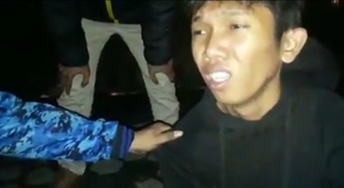 salah satu pelaku pengrusakan bendera partai Demokrat