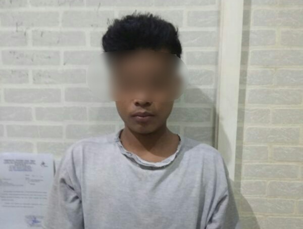 Pelaku yang sudah diamankan polisi (istimewa)