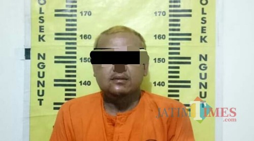 Ani Yulianto saat diamankan di Mapolsek Ngunut /Foto : Dokpol / Tulungagung TIMES