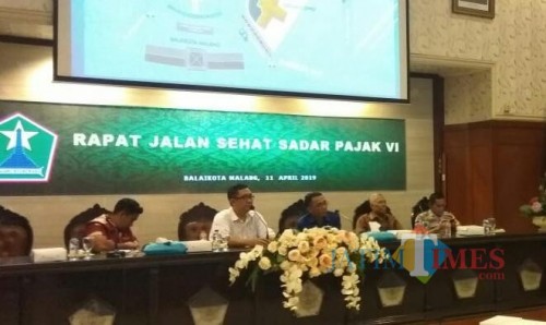Rapat koordinasi panitia gabungan Jalan Sehat Arema Sadar Pajak VI 2019 di Balai Kota Malang. (Foto: Nurlayla Ratri/MalangTIMES)