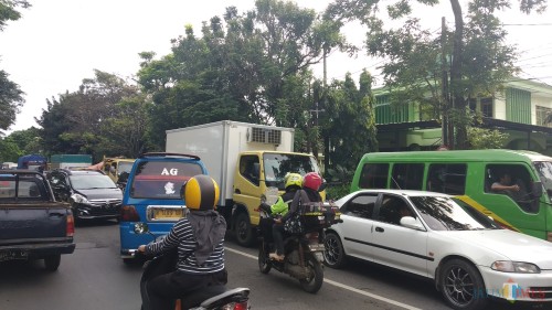Ilustrasi macet (Pipit Anggraeni/MalangTIMES).
