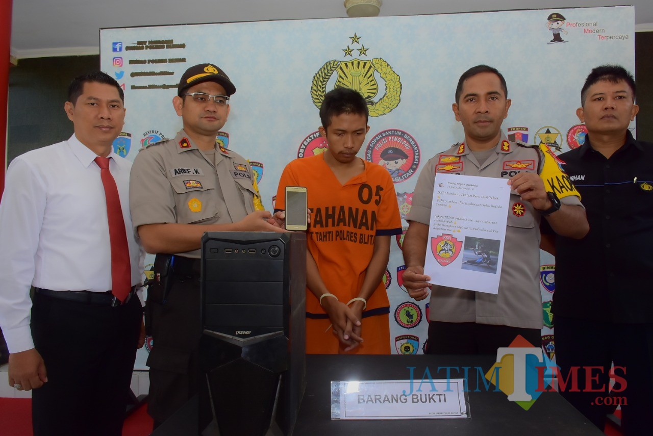 Pelaku Huda ditangkap Polres Blitar dan diamankan dengan sejumlah barang bukti ujaran kebencian.