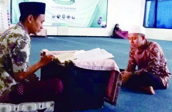 Persiapan salah satu hafiz UIN Malang untuk PIONIR 2019. (Foto: Humas)