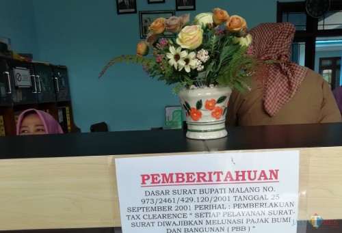 Kebijakan tax clearence diuji coba desa untuk percepatan pelunasan PBB-P2. (Nana)