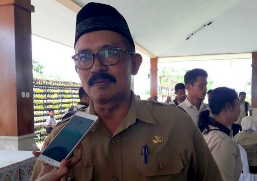 Kepala Dinsos Kab Blitar, Romelan.(Foto : ist/beritablitar)