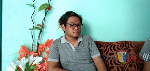 Riza Abdillah Khoir, salah satu warga Tulungagung yang memilih pulang ke Tulungagng pasca kerusuhan Wamena 23 September lalu (foto : Joko Pramono/jatim Times)