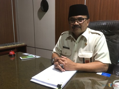 Kepala Bapenda Kabupaten Malang, Dr Purnadi saat menjelaskan potensi retribusi daerah di Kabupaten Malang (Foto: Ashaq Lupito/ MalangTIMES)