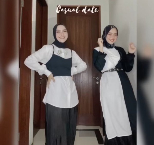 Styling black white vibes ala hijabers Tiqasya. (Foto: Instagram @tiqasya).