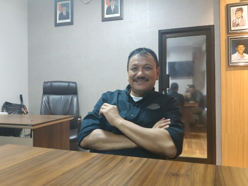 Ketua umum KONI Kota Malang, Eddy Wahyono (Hendra Saputra)