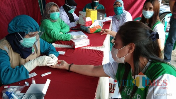 GTPP terus melakukan tindakan antisipasi penyebaran Covid 19 (Joko Pramono / Jatim TIMES)