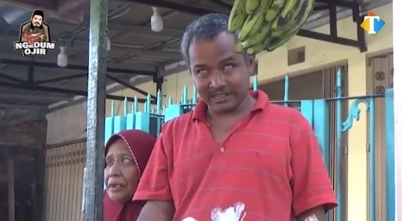 Pasutri buta mencari nafkah demi 2 anaknya (Foto: IST JatimTimes)
