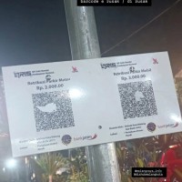 Viral Barcode QRIS Parkir Pasar Bunul Dirusak?