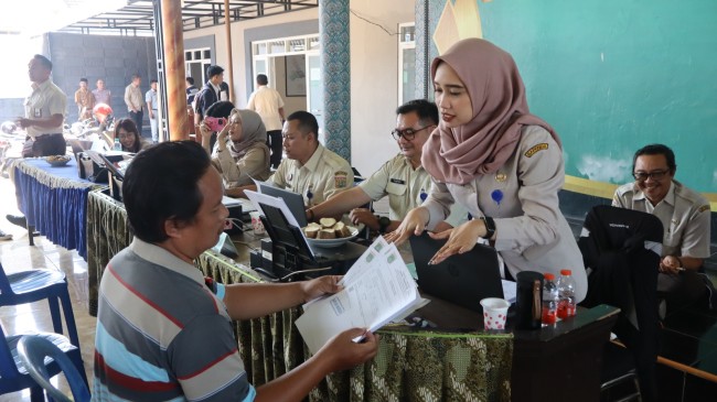 Layanan perpajakan BMW di Desa Tajinan, Kecamatan Tajinan, Kabupaten Malang.