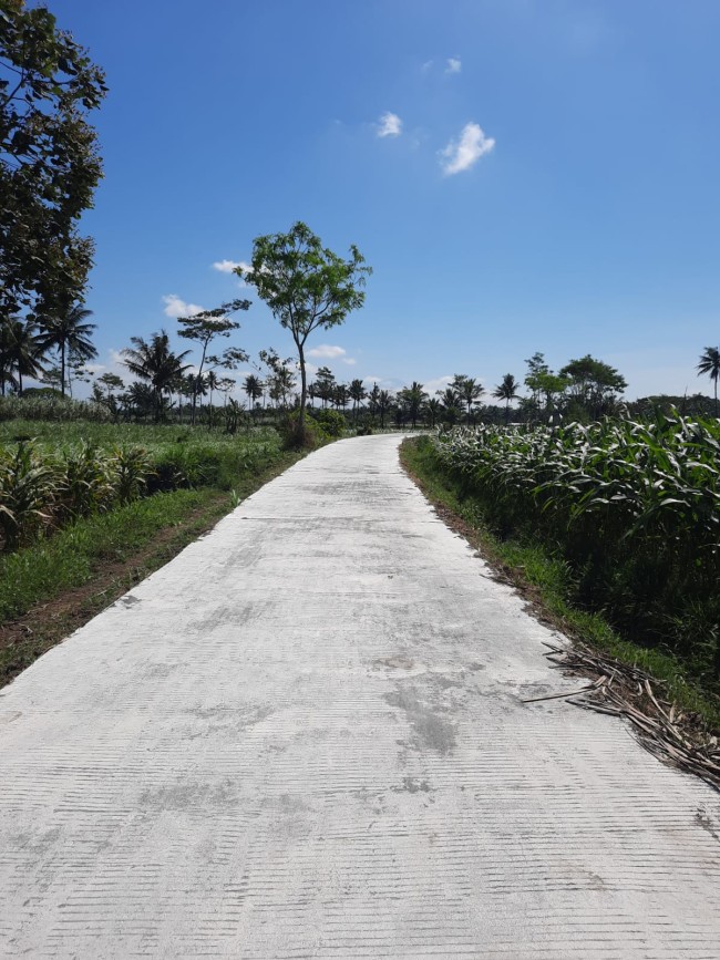 Jalan lingkungan yang dibangun DPKPCK. (Foto: ist)